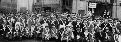 The 1932 Newsboys pose outside The Detroit News building before setting out on their annual newspaper sale.