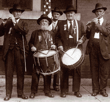 This group of veterans -- four from Michigan and one from Ohio -- played the same instruments they played in the war at a GAR encampment in Maine in 1929. From left, E.B. Stilson, 80, of Detroit; William Didswell, 86, of Adrian; color bearer J.A. Hamilton of Lansing; Samuel Treat, 90, of Coldwater and R.W. Page, 71, of Vaughnsville, Ohio.