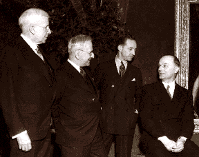 DIA Director Dr. W. R. Valentiner, at right, worked closely with Edsel Ford, second from right, on the Rivera Murals. The two are shown here with Edgar B. Whitcomb, left, and Albert Kahn. 