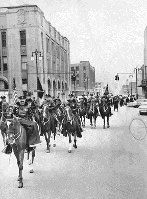 Mounted police lead the Goodfellows parade down Lafayette in 1961.