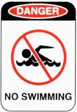 NO SWIMMING - © 1986, Hawaiian Lifeguard Association. All Rights Reserved.