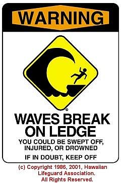 WAVES BREAK ON LEDGE - © 1986, 2001, Hawaiian Lifeguard Association. All Rights Reserved.