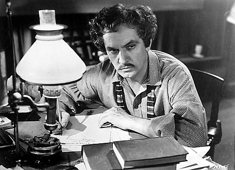 FREDRIC MARCH in the title role of Rapper's favorite among his movies, "The Adventures of Mark Twain."