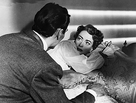 JACK PALANCE throws a scare into JOAN CRAWFORD ina scene from&quot;Sudden Fear.&quot;
