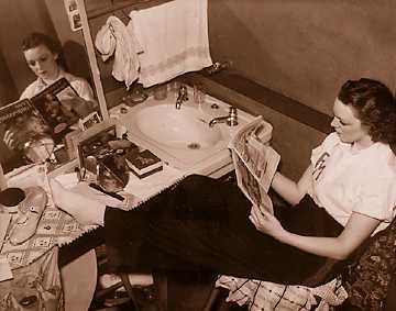 This photo, part of a Detroit News feature article that suggested Fox chorus girls spent their time reading romance magazines, touched off an angry reaction that ended with the girls challenging the News to find six Detroit women for them to debate in an intelligence contest.