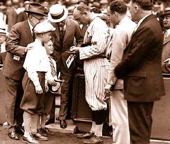 Cobb signs autographs prior to a game at Navin Field in 1925